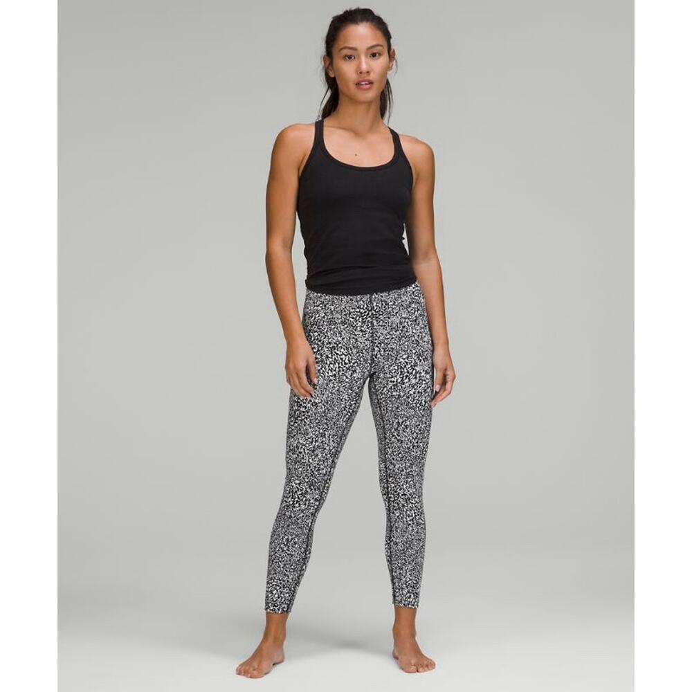 Lululemon InStill High Rise Tight 25" Womens 4 Black White Crop Leggings Logo